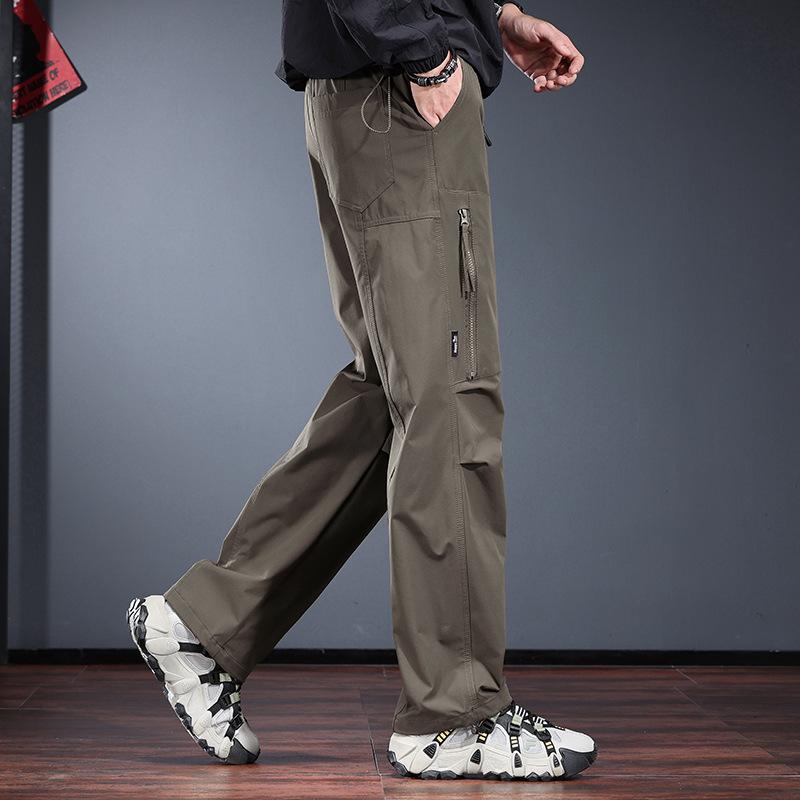 High-end outdoor charging casual pants men's loose straight paratrooper pants three-proof hiking sports mountain tooling trousers tide