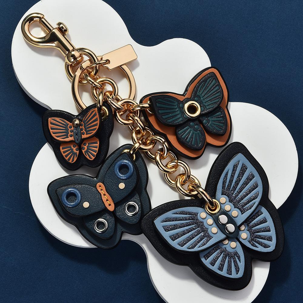 Bunte Schmetterlingsserie überlagerter Schmetterlingsschnur modischer Taschenanhänger Quaste Schmetterlingsanhänger