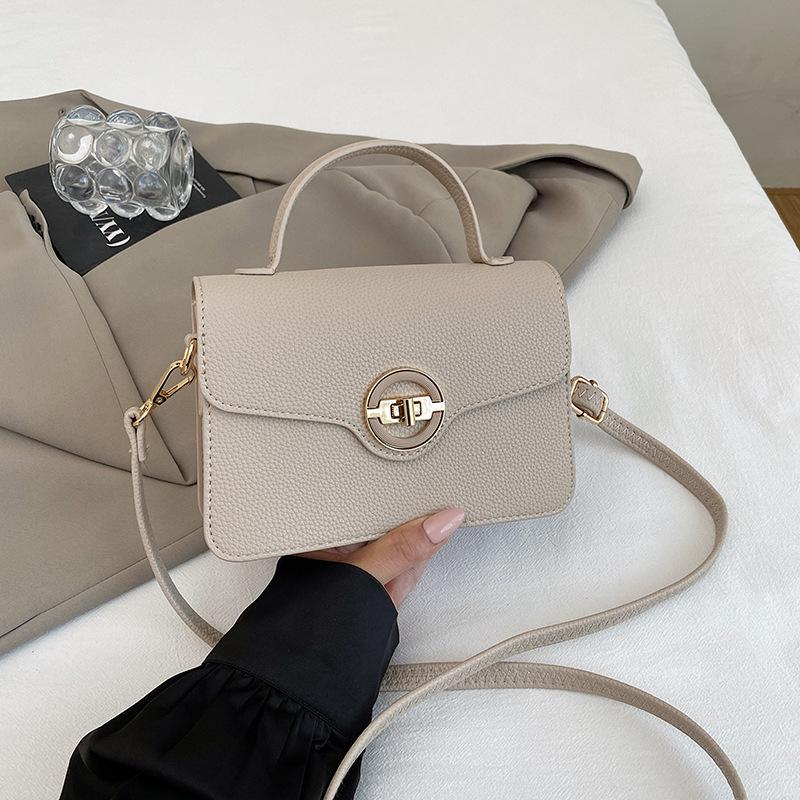 

Stylish simple fashion casual portable small square bag women s 2025 autumn new trend commuter messenger shoulder bag хаки