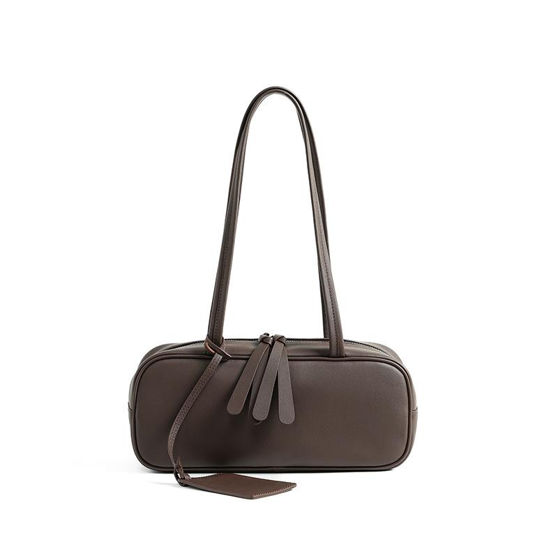 

Женская сумка-боулинг из коровьей кожи первого слоя, женская сумка для поездок на работу, нишевый багет из кожи, новая высококлассная сумка под мышкой