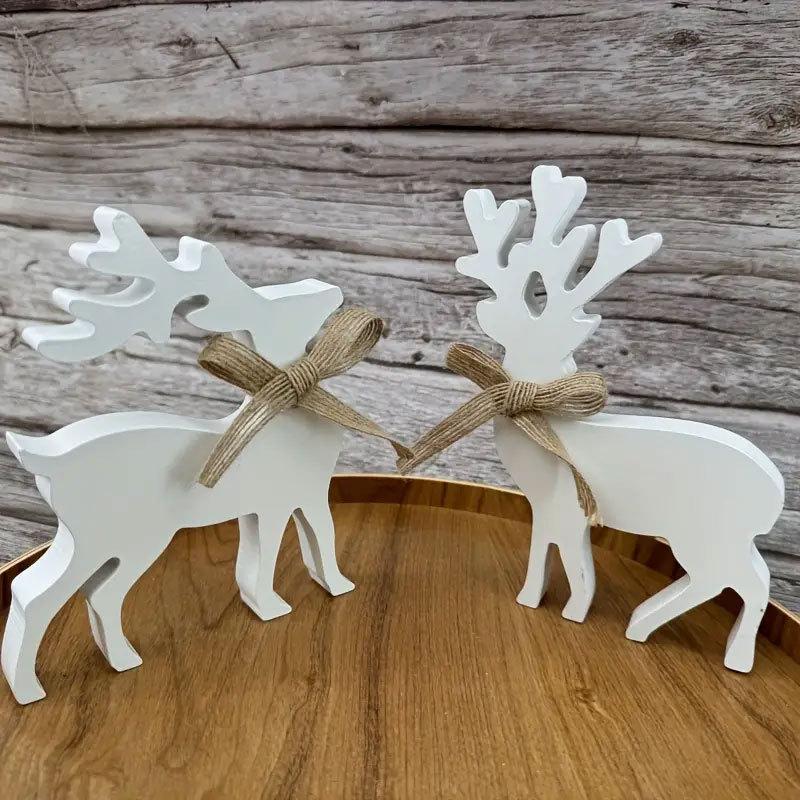 Weihnachtsrentierdekorationen, weiße Rentier-Holzbastelarbeiten, Kleiderschrankfensterbänke, festliche Atmosphäre Ornamente