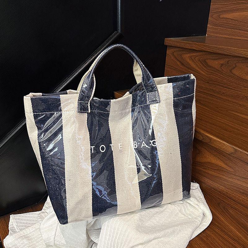

Large Capacity Jelly Bag Women 2025 New Versitile Fashion Transparent PVC Waterproof Handbag Commuter Tote Bag Blue