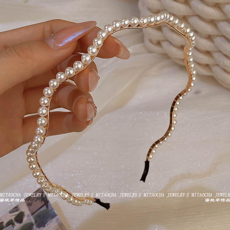 

Корейская жемчужная повязка на голову с отверстиями для волос женская летняя высококачественная повязка на голову женская 2026 новая супер-фея повязка для умывания лица головной убор