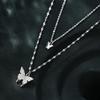 Butterfly Peace Buckle Necklace for Women In Nickel Silver Plated Gold - Elegant and Translucent Design