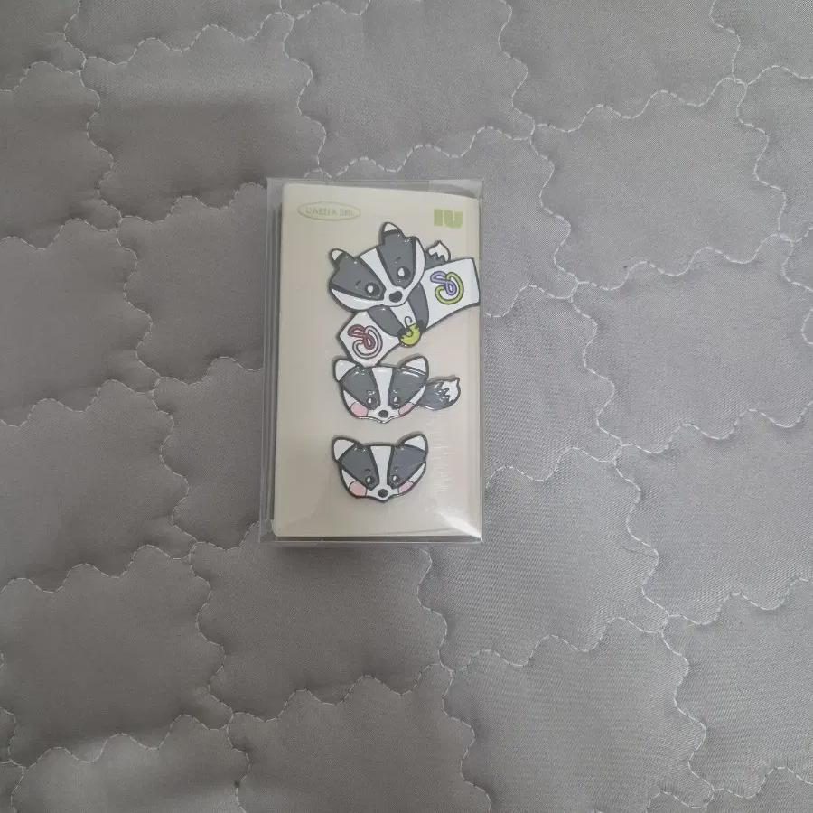 

Значок Iu Барсука