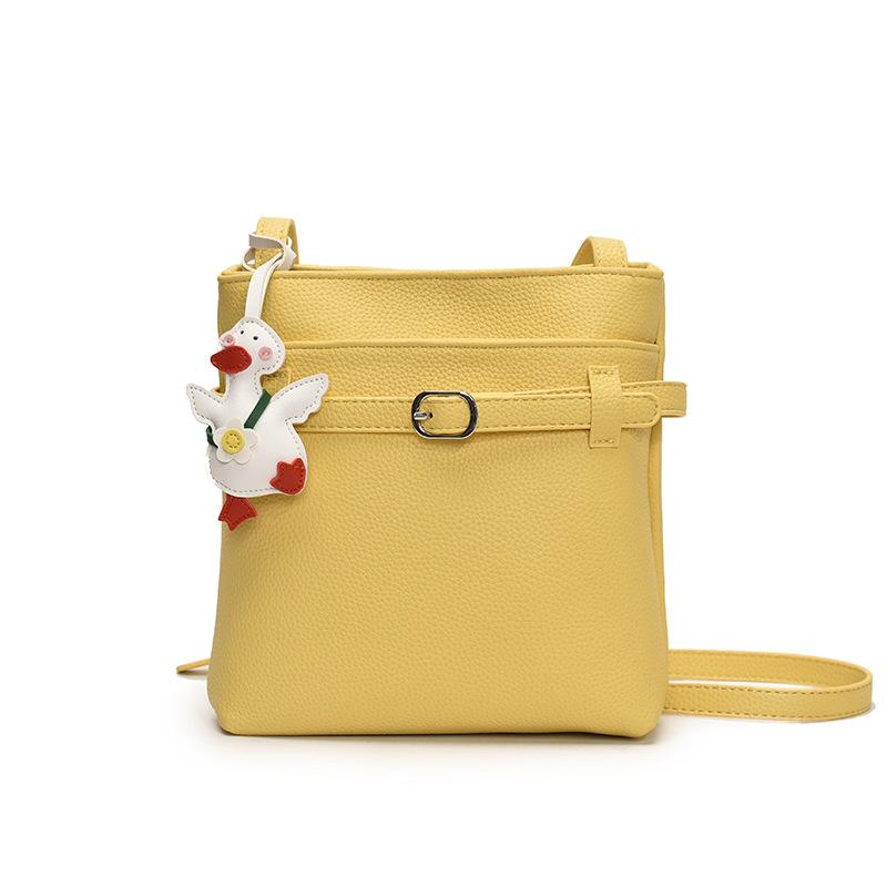 Spring and summer new Korean niche simple lychee pattern bucket bag casual commuting versatile high sense messenger women's bag