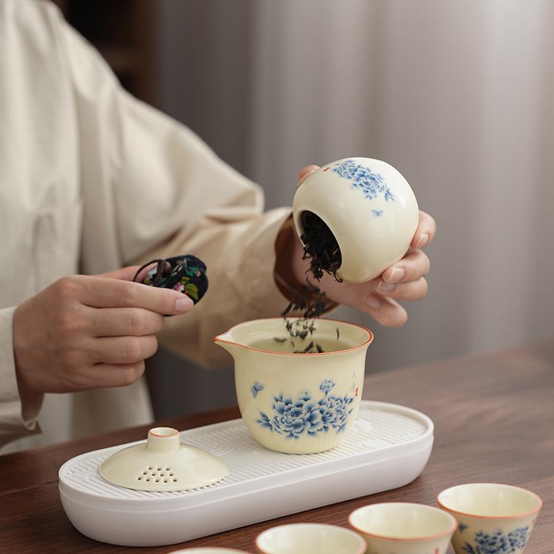 Ru kiln travel tea set Qingyun small set household simple brewing teapot kung fu portable bag teacup outdoor