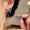 Oregelbundna blå fjärilsörhängen Mori superfeerisk temperamentörhängen söta coola studs