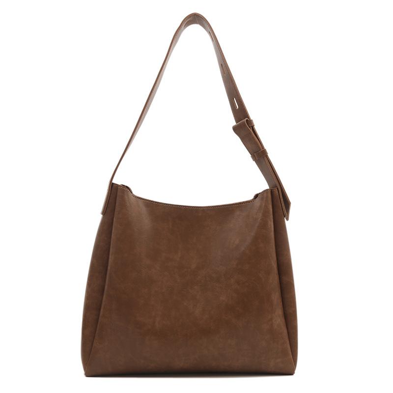 

Жіноча сумка через плече. Модна сумка коричневий