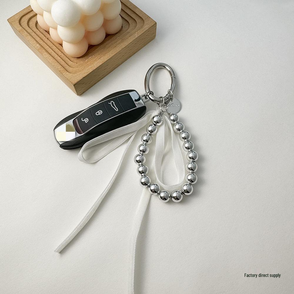 Korean-Style Bow Car Keychain with High-End Silver Bead Ribbon Pendant
