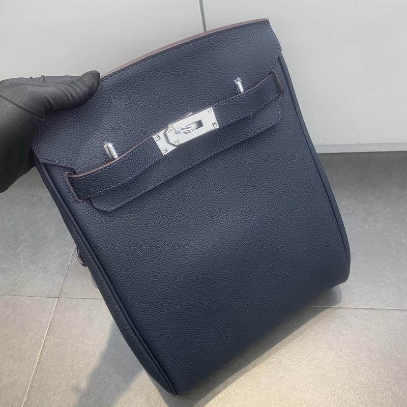 26 Neue erste Schicht Rindsleder Togo quadratische Schlüsselloch Brusttasche Unisex Leder Bauchtasche schräg über Körper tragbare Umhängetasche modisch Rücken