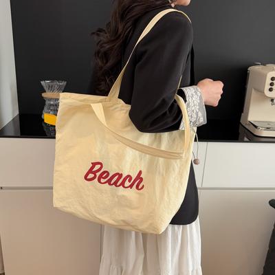Frühling und Sommer neue modische große Schulter-Achseltasche Damen einfache Pendler-Studenten-Tragetasche