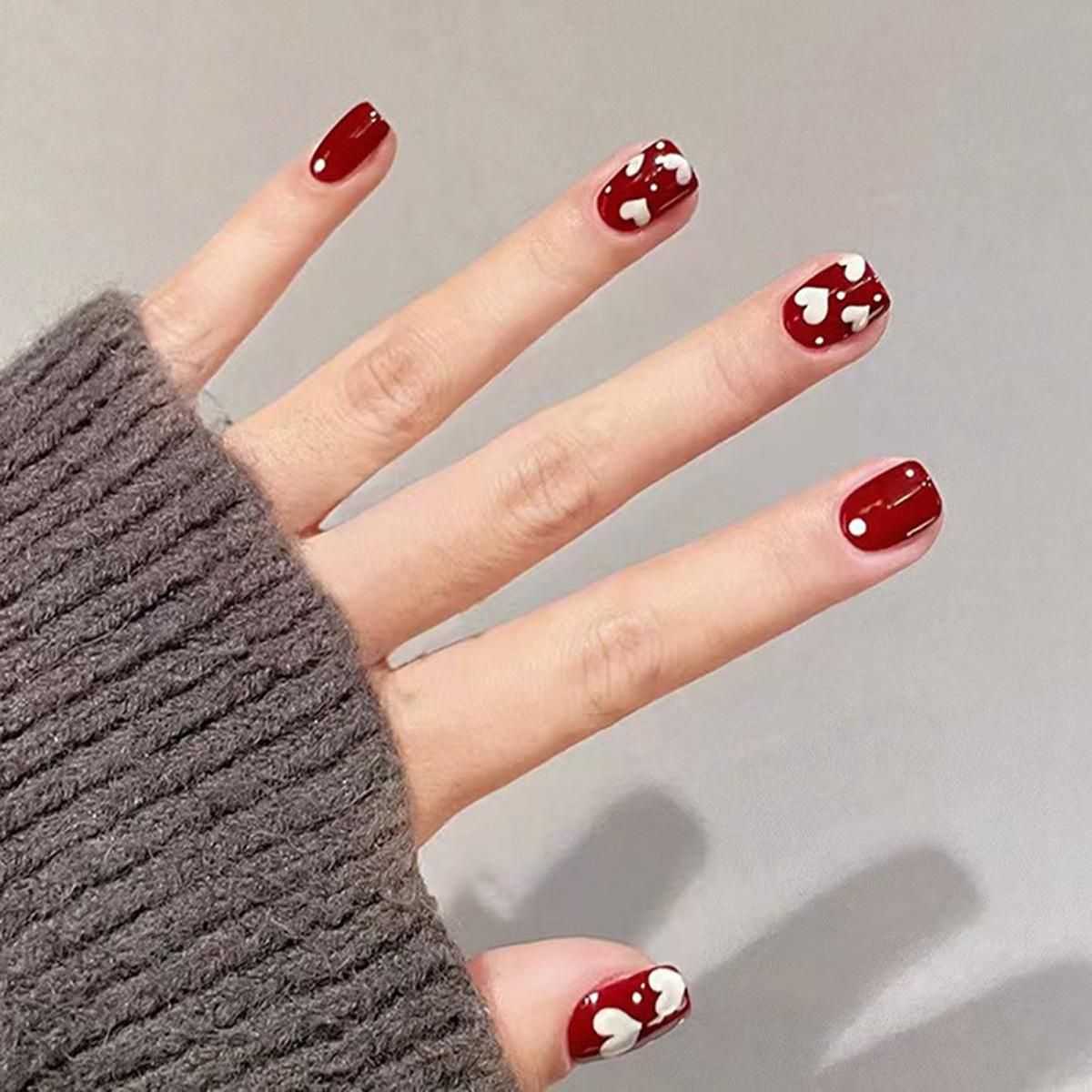 

Red Heart Press-On Nails: Simple, Versatile, and Whitening Nail Tips (24 Pieces)