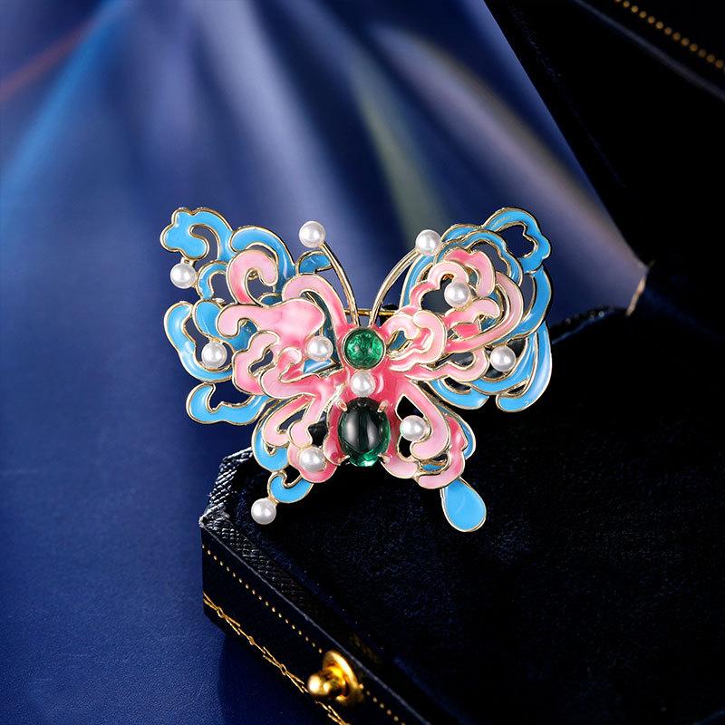 

Enamel color hollow butterfly brooch female elegant atmosphere cheongsam jacket pin design sense anti-light corsage разноцветный
