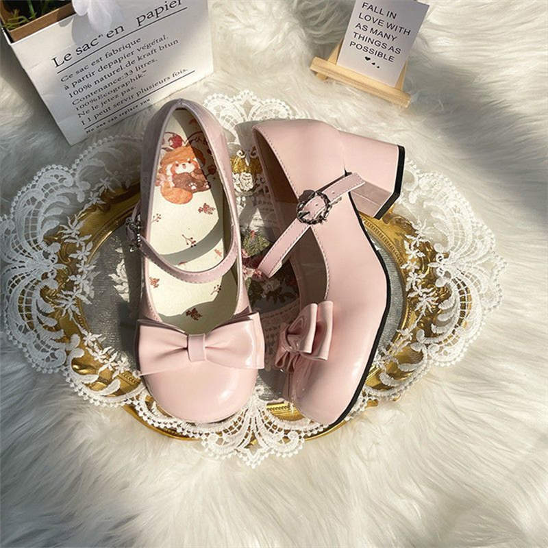 Sweet and cute lolita girl medium and high heel Mary Jane shoes round head bow light mouth one-word buckle belt jk single shoes
