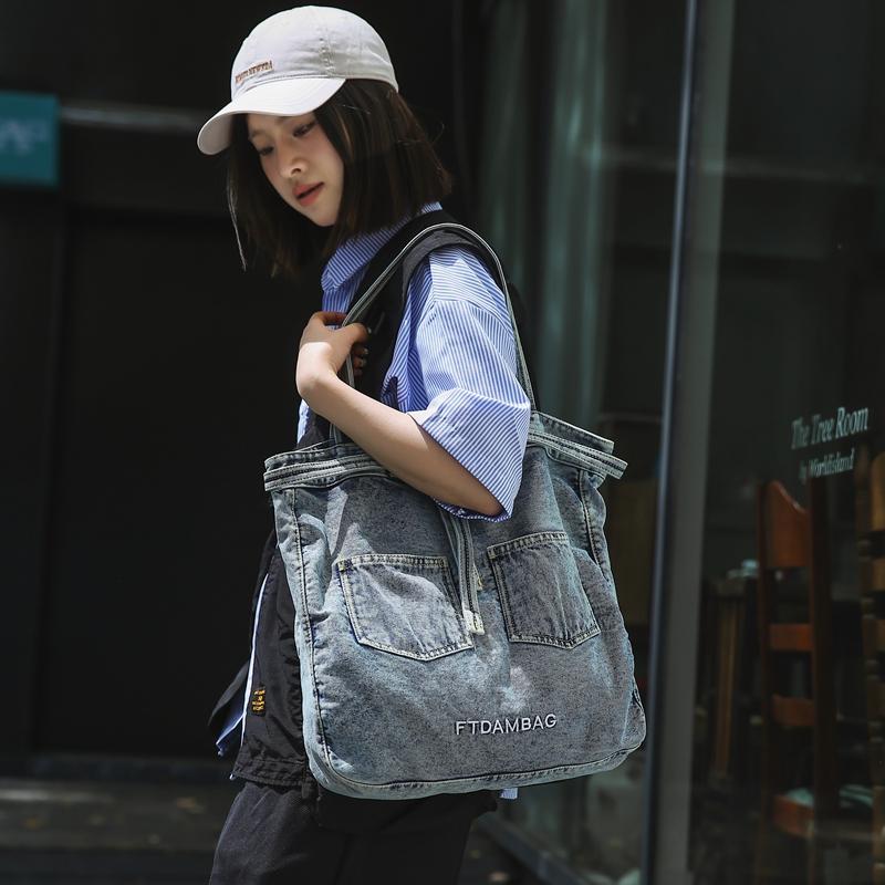 Stylish Denim Tote Bag for Women – Classic Jeans Design with Front Pockets and Embroidered Logo, Perfect for Casual Use