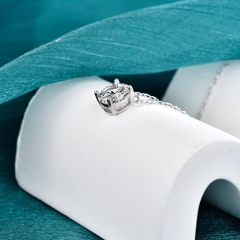 Moissanite Classic Four-Prong Necklace: Simple S925 Sterling Silver Pendant for Women, Japanese & Korean Inspired Light Luxury Style.