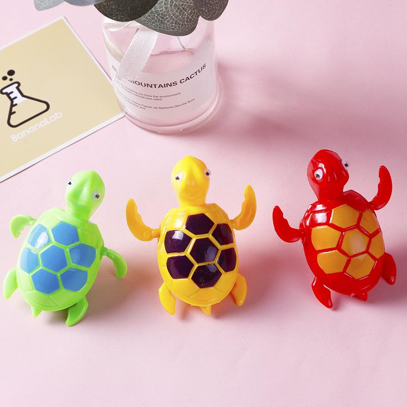 Spring-Loaded Green Frog Wind-Up Water Toy