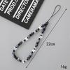 Elegant Pearl Bow Beaded Phone Chain and Versatile Lanyard for Women