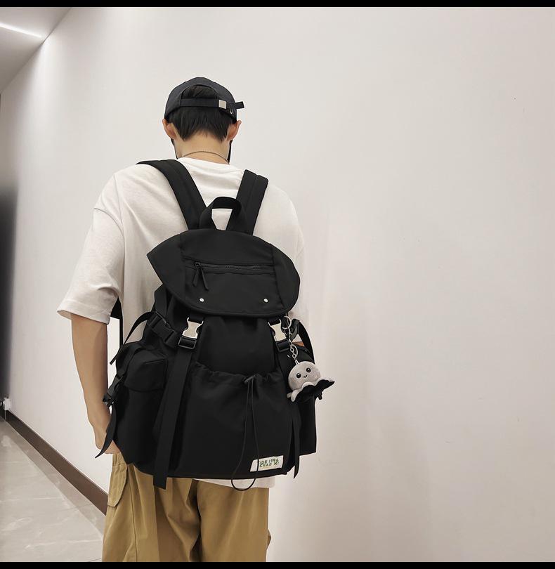 Ryggsäck för män med stor kapacitet och enfärgad design för studenter eller par