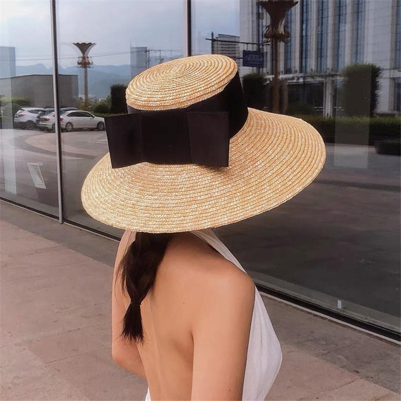 202507-nu ins chic summer handmade straw wide ribm big bowknot model show lady beach cap leisure sun hat sale