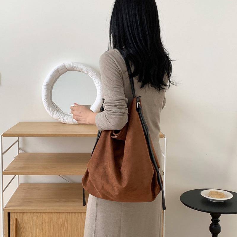 Nuova borsa tote grande capacità camoscio casual versatile borsa da pendolare donna retrò pelle morbida diagonale semplice borsa a tracolla