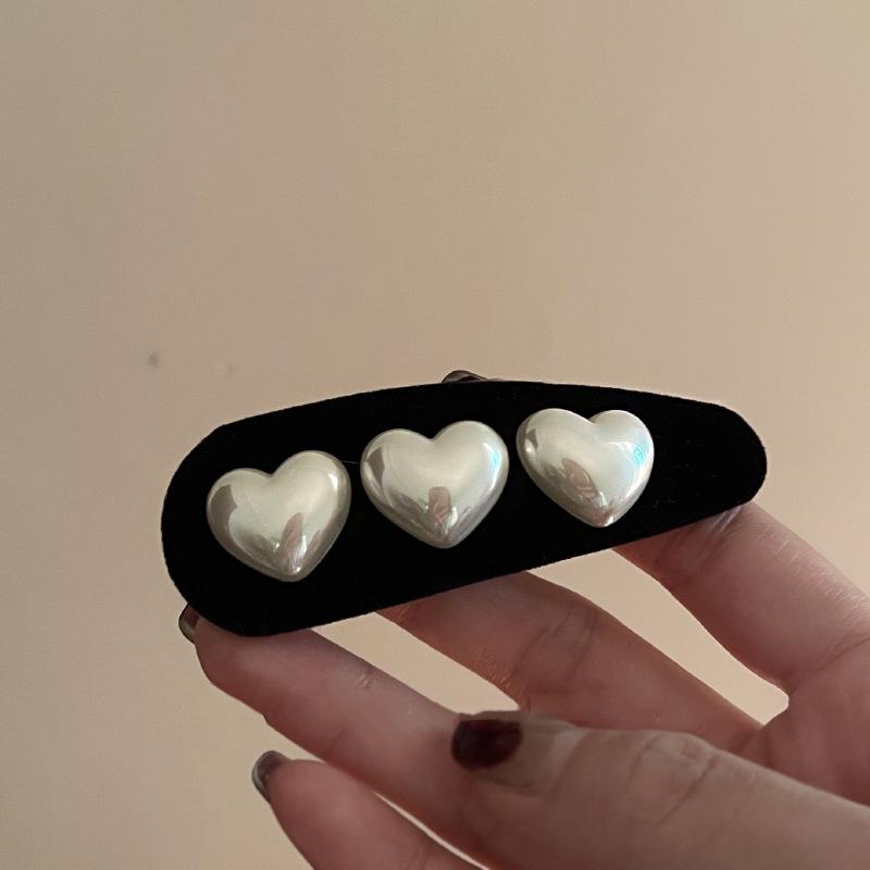 Premium Love Heart Hårnål: Elegant hårklipp for kvinner med enkel vanndråpedesign for elegant stil