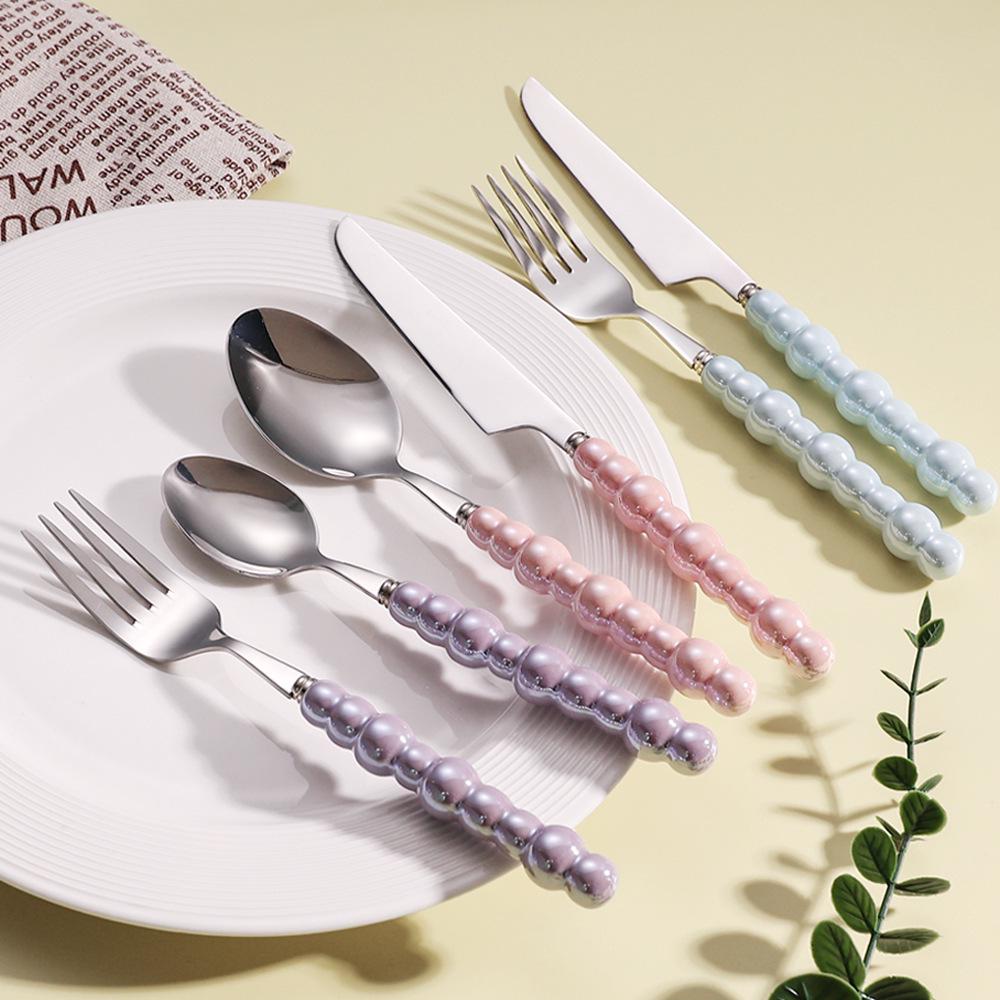 Elegant 304 Stainless Steel Cutlery Set: Knife, Fork & Spoon with Creative Pearl Ceramic Handles. Perfect for Western Steak & Dessert.