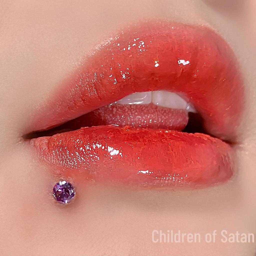 'Satan's Child: Luxury Diamond Lip and Ear Studs for Bold Women'