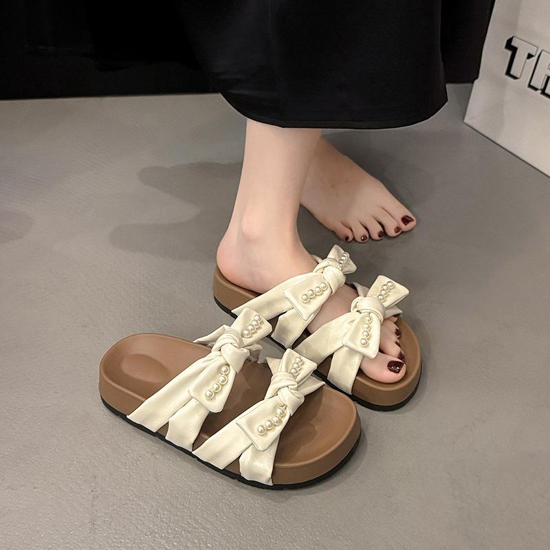 Slippers girl 2025 summer new Korean version of Internet celebrity fairy style bow pearl fashion wear one word cool slippers
