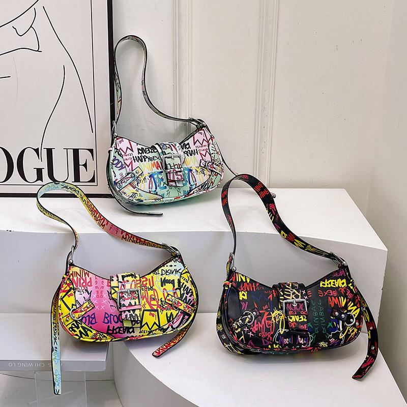 Internet-Berühmtheit Achseltasche 2025 neu Koreanische Version Mode Graffiti Buchstaben Umhängetasche ins Tide Damen Crossbody Knödeltasche