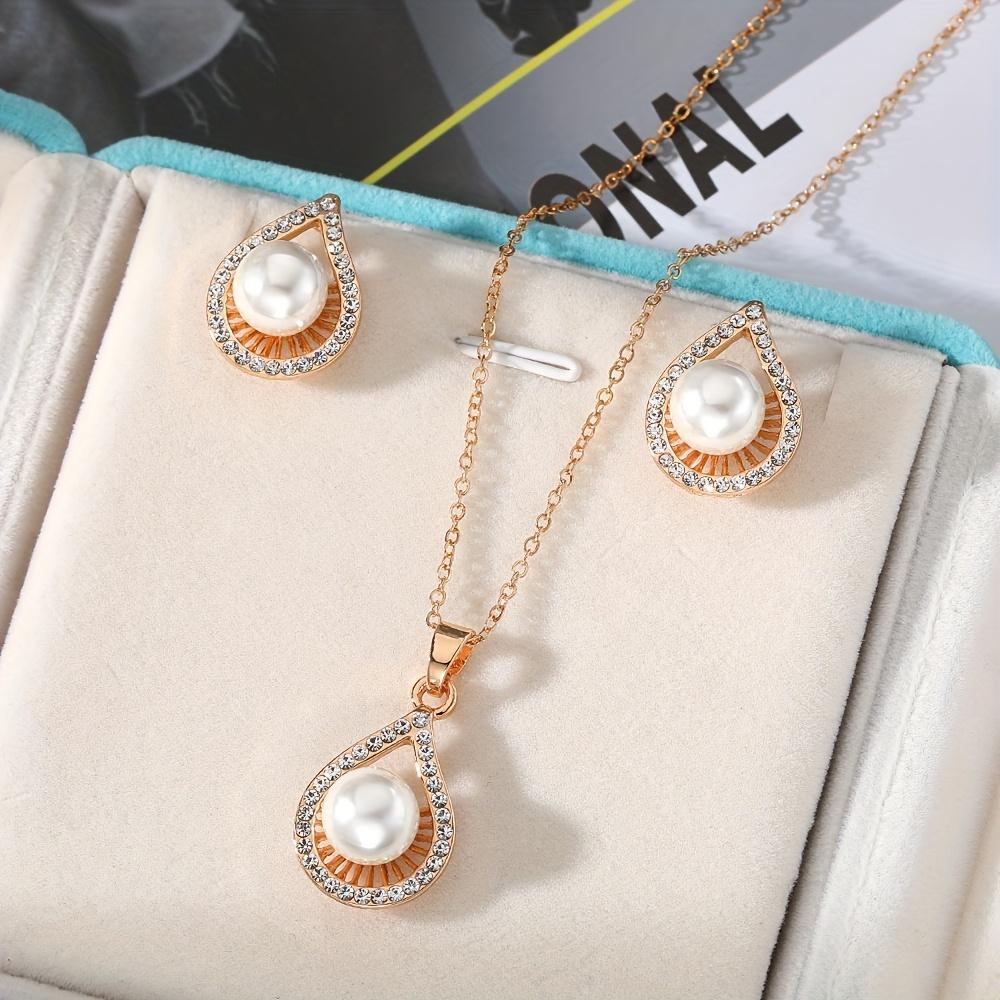Wedding accessories set: necklace and earrings, water drop-shaped with rhinestones and imitation pearls