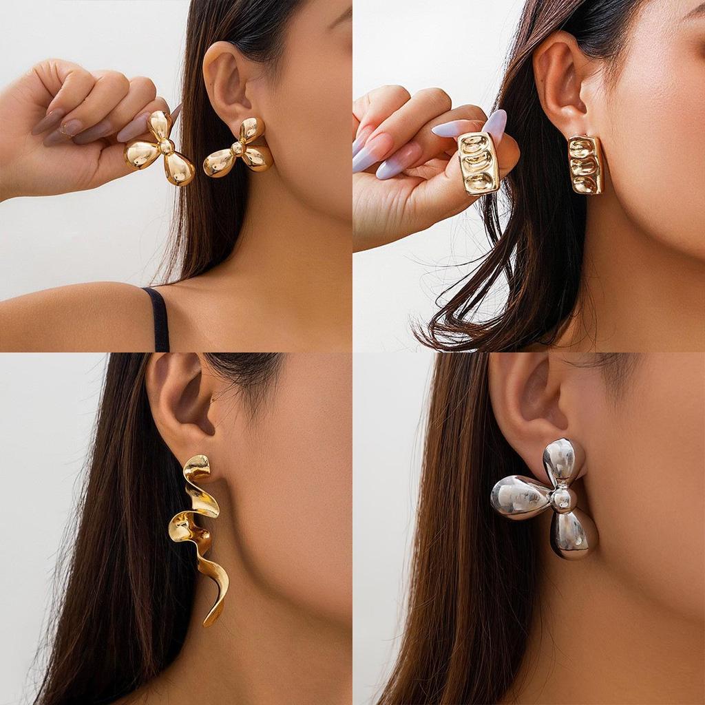 Elegant Textured Metal Flower and Wing Stud Earrings – European & American Style