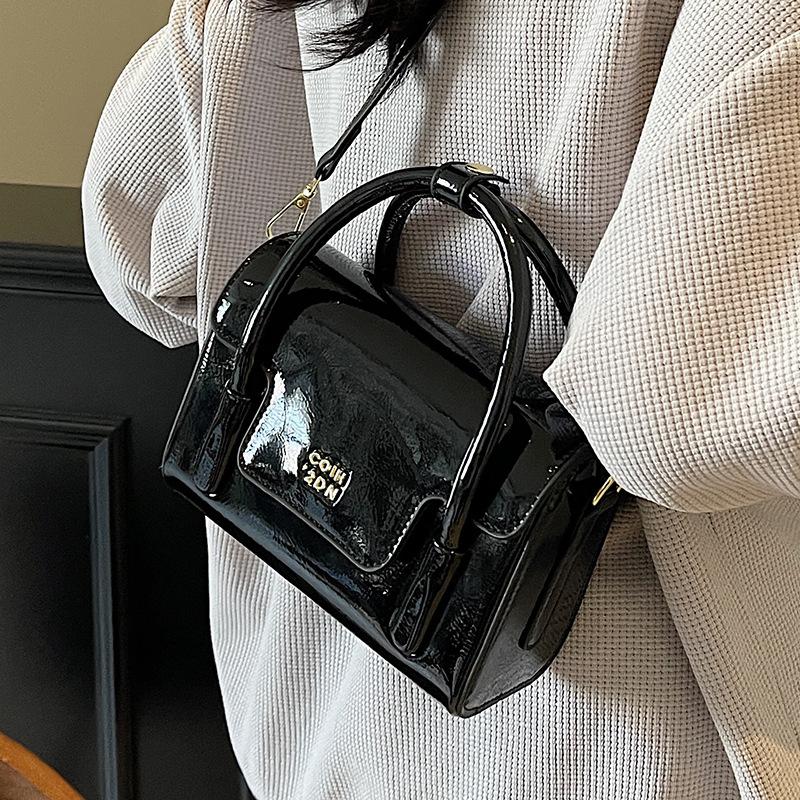 This year, it is popular for casual and simple oil wax leather portable small square bags, versatile solid color high-end texture women's messenger
