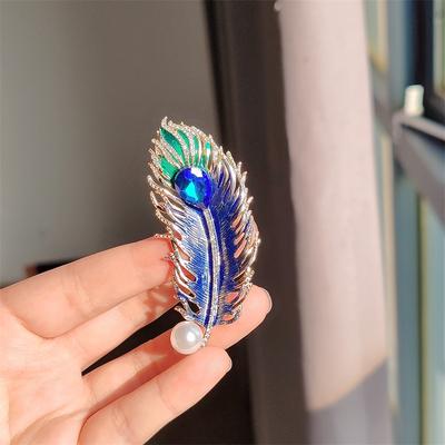 Spilla di alta gamma creativa e personalizzata in stile retrò con piuma di pavone, colorata con smalto a goccia e diamanti, corsage, accessori per abbigliamento