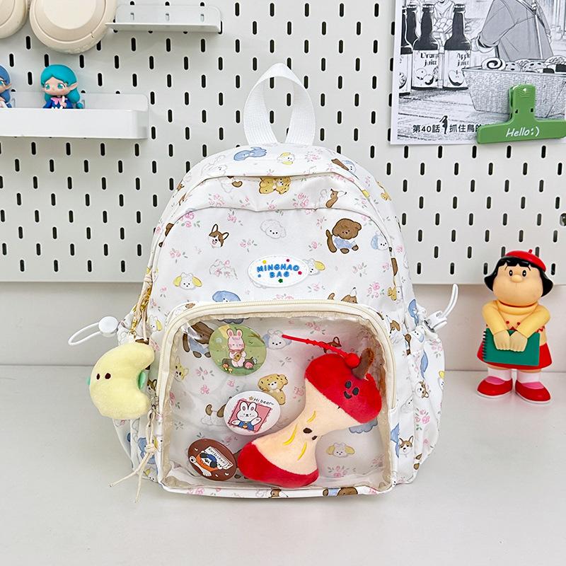 Cute graffiti schoolbag for junior high school girls, large capacity backpack, transparent bar, bandage board, pain bag, student backpack
