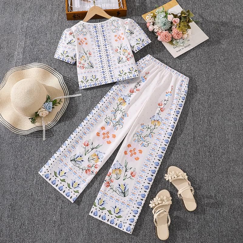 Girls' Fashion White Set: Spring/Summer Children's Casual Two-Piece Set with Puff-Sleeve Top and Wide-Leg Pants