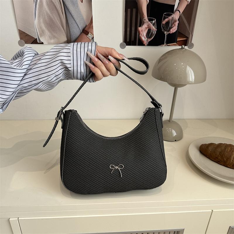 

Popular bow fashion French retro solid color underarm bag women s casual personality this and that textured shoulder bag