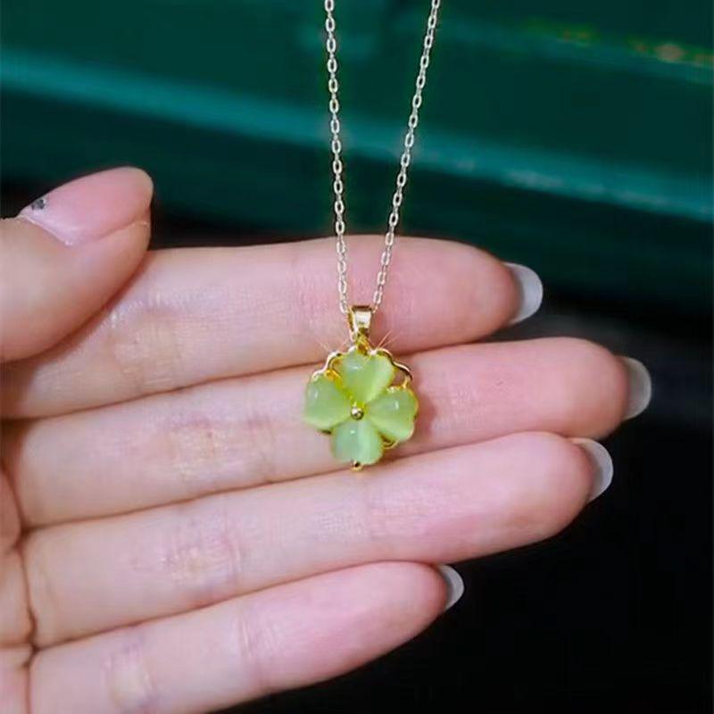 Four-Leaf Clover Rotating Cat s Eye Stone Necklace: Lucky, Stylish Copper Pendant for Women