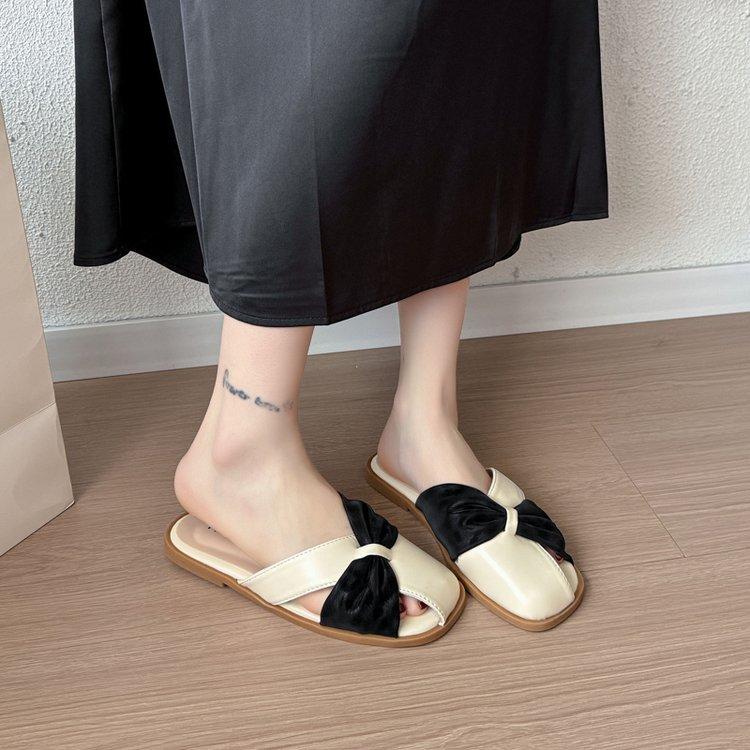French evening breeze temperament girl campus one pedal slippers outside wearing non-slip flat bottom bag head half drag cool slippers