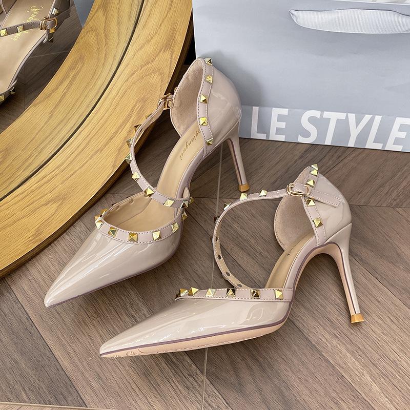 One-word women's rivet sandals 2025 summer new fashionable and sexy European and American light-mouth thin-heeled bright leather high-heeled shoes