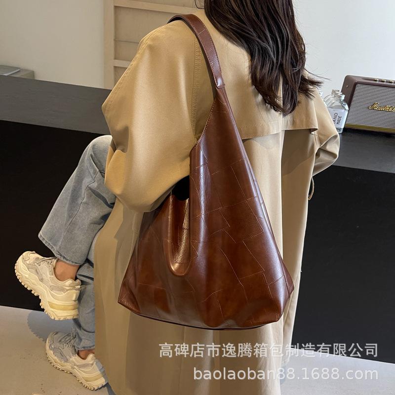 

Нова сумка через плече 2024 року, повсякденна модна місткість, жіноча сумка в іноземному стилі, жіноча сумка з високим сенсом, жіноча сумка для переноски в руках темно-коричневого кольору