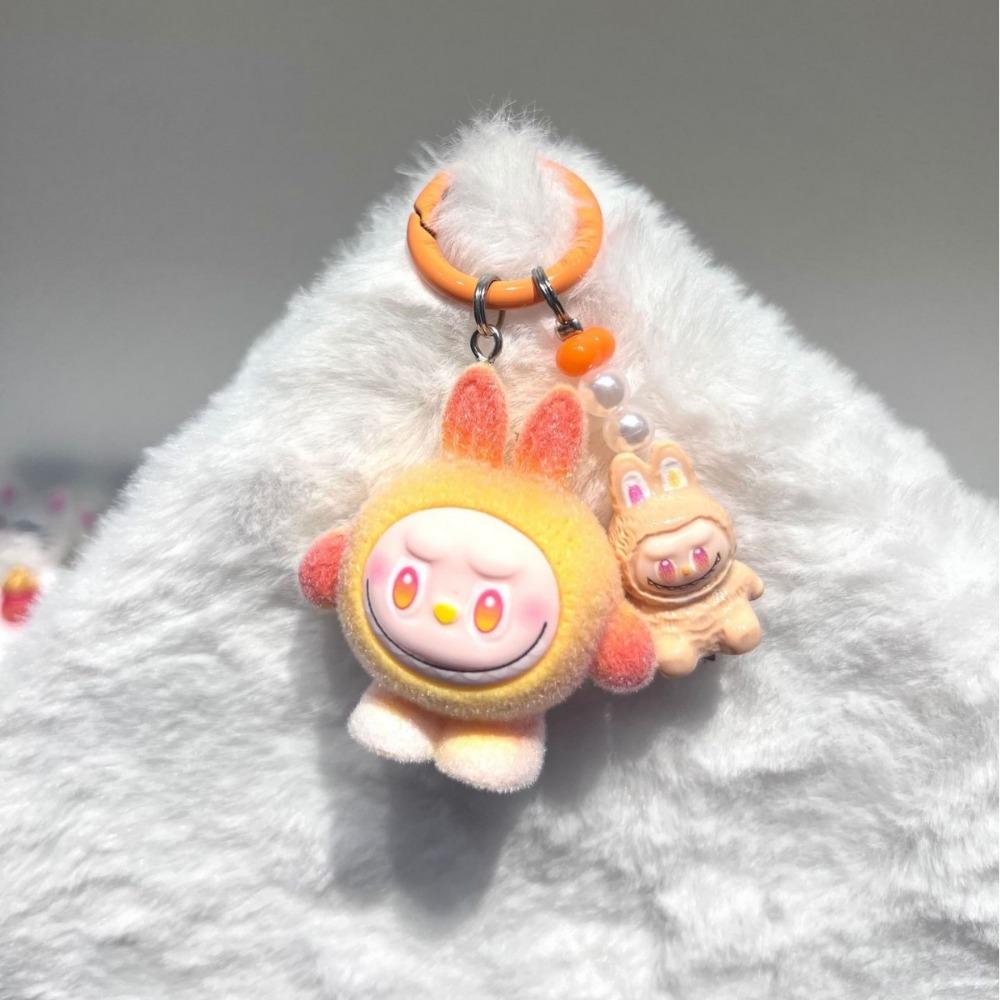 

Flocking Egg Boy Pull High-value Cute Mini Doll Tide Play Ornament Pendant Resin Accessories оранжевый