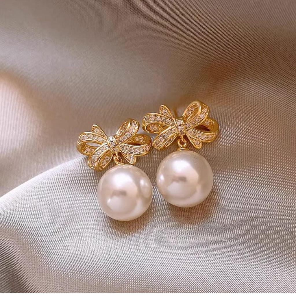2024 Korean Pearl Bow Stud Earrings - Versatile and Trendy High-End Fashion Drop