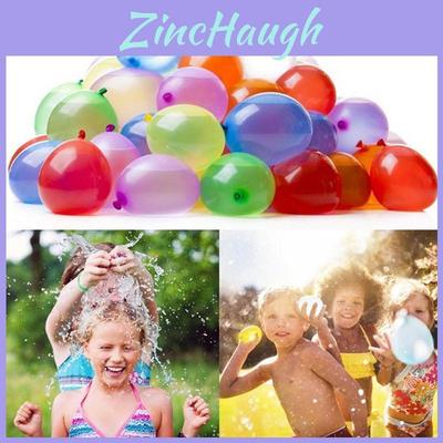 Sommerliche Gartenparty: Streich mit Luftballons – Kinder spielen im Wasser