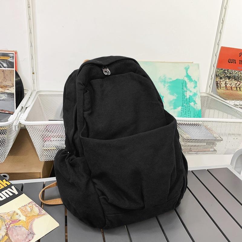 

Solid color schoolbag high school college student washed canvas backpack versatile couple backpack чорний