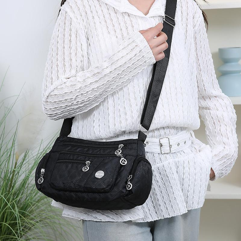 Outdoor Leisure Joker Messenger Bag Female Large Capacity Rhombic Embroidery Simple Shoulder Bag Three Layer Storage Middle Aged Handbag.