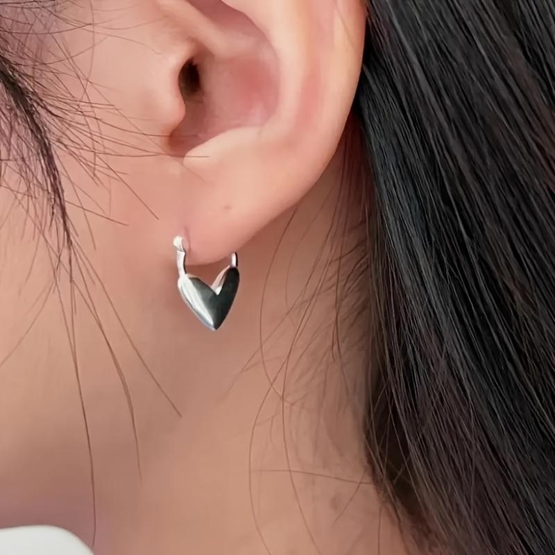 A Pair of Silver Heart-shaped Earrings, Unisex Bohemian Retro Style, Love Themed Jewelry, A Perfect Gift Accessory for Versatile Temperament.