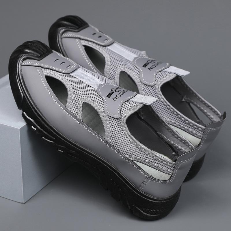 Mode Sommer Neue Atmungsaktive Herren Baotou Sandalen mit Hohlnetz Outdoor Sport und Freizeit Strand Herrenschuhe