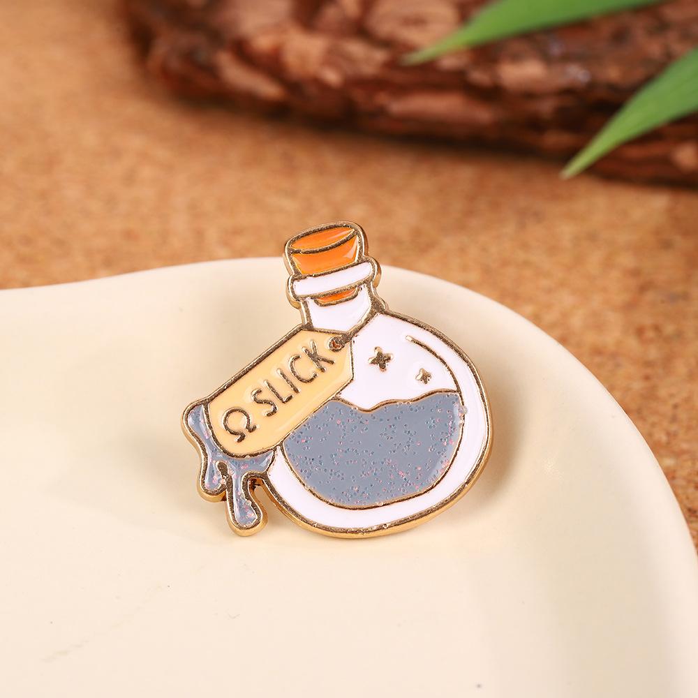 Cute little fresh magic potion cartoon brooch design high-end brooch versatile clothing